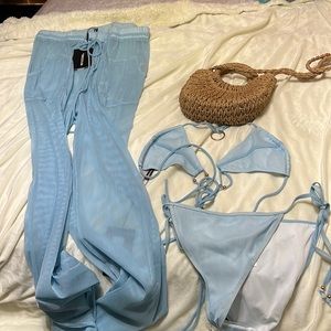 Bright Blue Sheer Ribbed wide leg beach pant, bikini top, bikini bottoms.